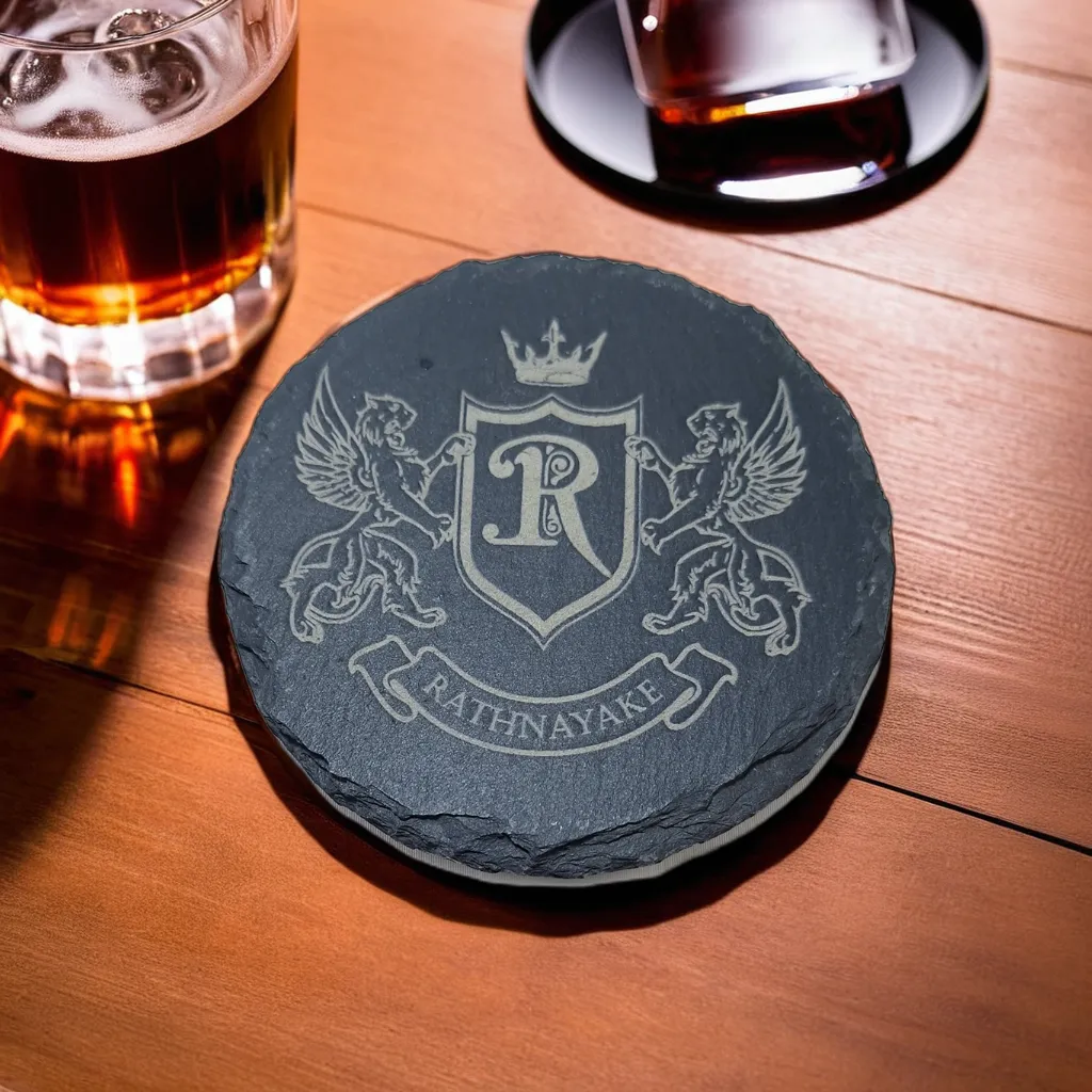 Engraved slate coaster with initial monogram and surname
